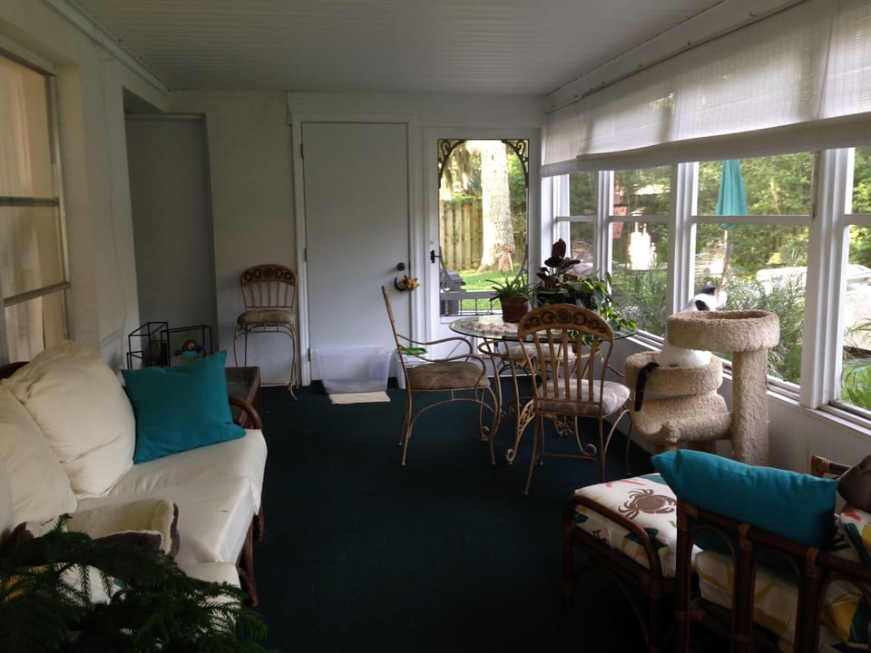 Screen porch takes advantage of warm summer evenings.