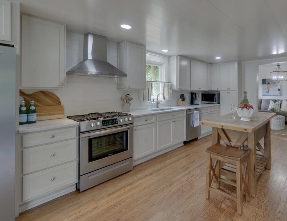 Kitchen with range/oven, fridge, microwave, and dishwasher 