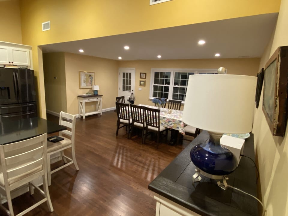 Open space dining and kitchen area.  Table sits 10 and kitchen island sits 4
