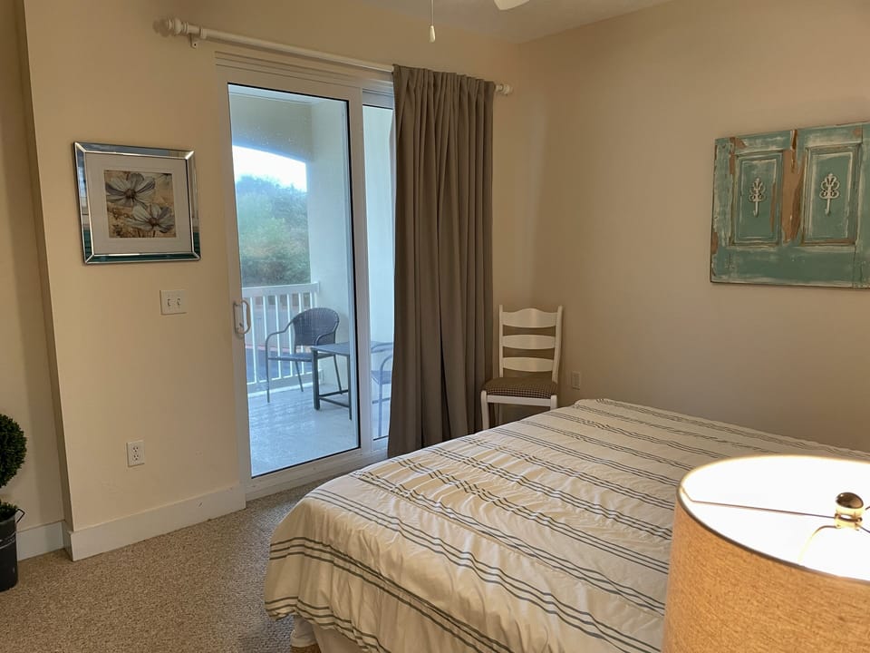 Master bedroom (2nd floor, north) with king bed, full bathroom and smart Roku tv