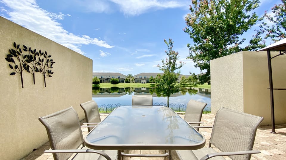 Enjoy the serene lake view from the outdoor area, perfect for relaxation