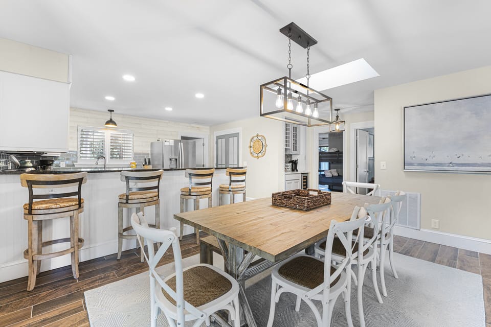Dining area just off kitchen with sliders out to the pool