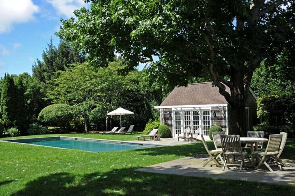 Grounds, patio dining table, gunite heated pool, pool house with shower/bathroom