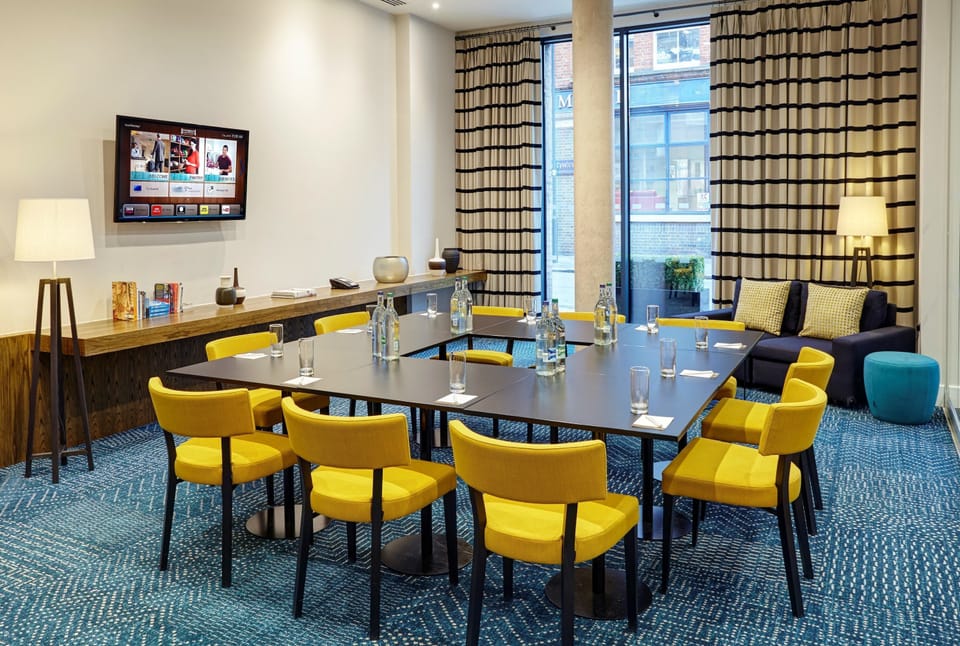 Get some work done in The Den meeting room.