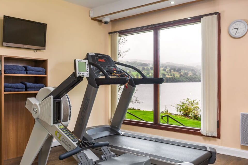 Well-equipped gym with a view, allowing for a workout with a scenic backdrop.