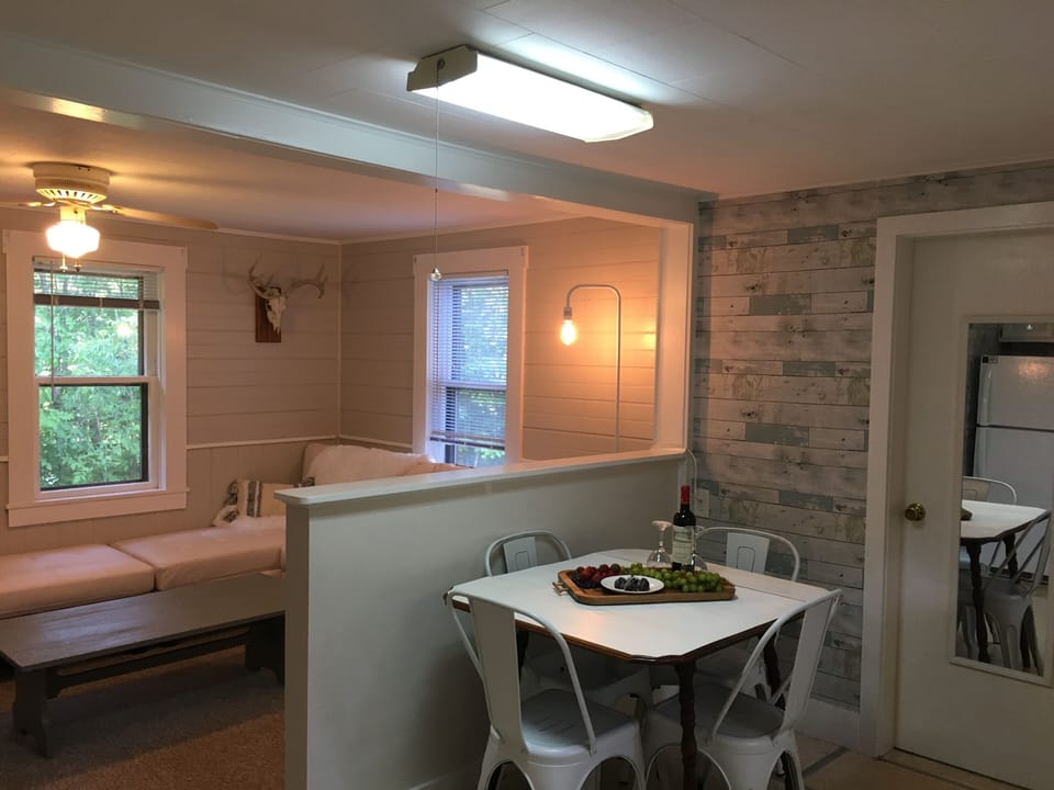 Step directly into the kitchen and the living room is just past the pony wall