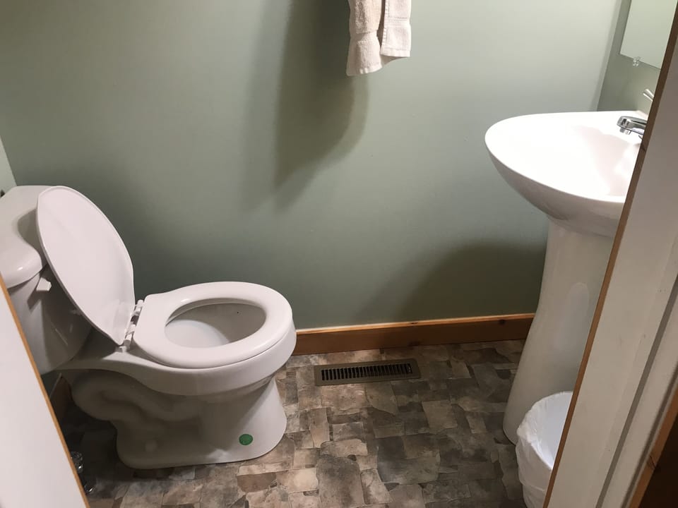 1/2 Bath Off of first floor primary.