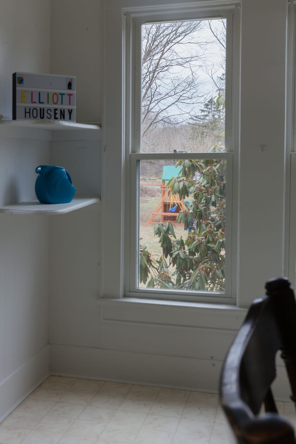 Swing set is visible from kitchen window