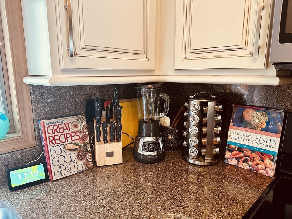 Fully stocked kitchen, granite counters, plates, cups, tons of supplies