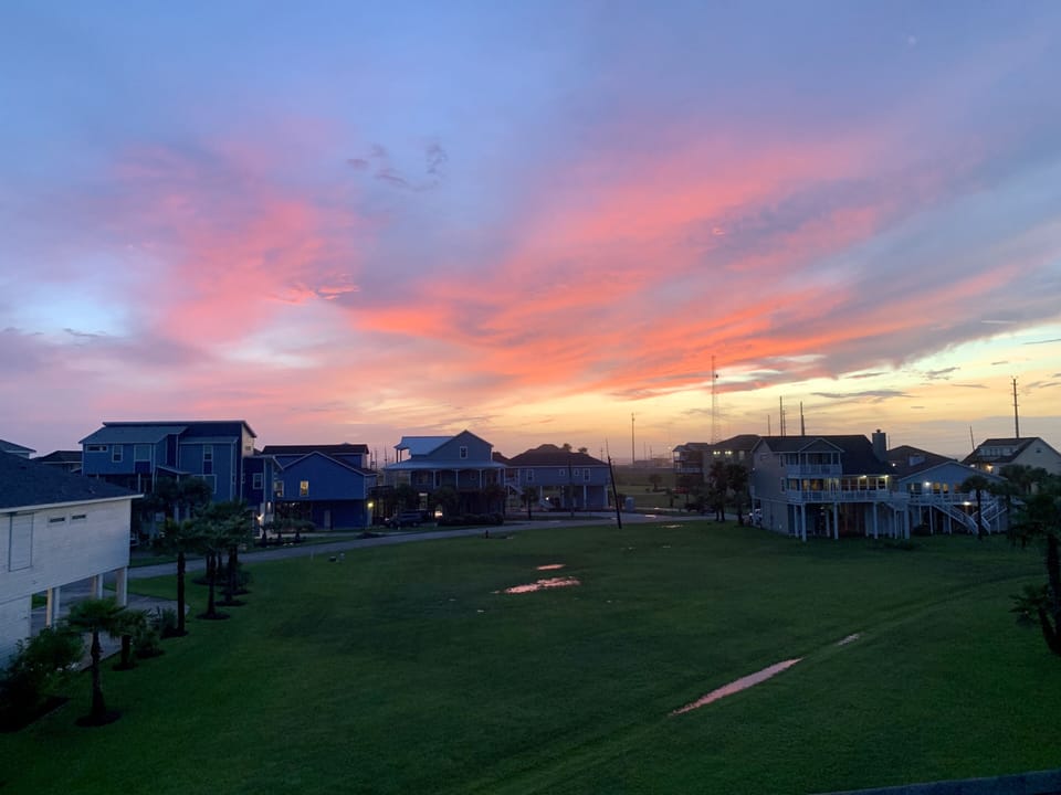 Sunset views from the deck off the primary bedroom.