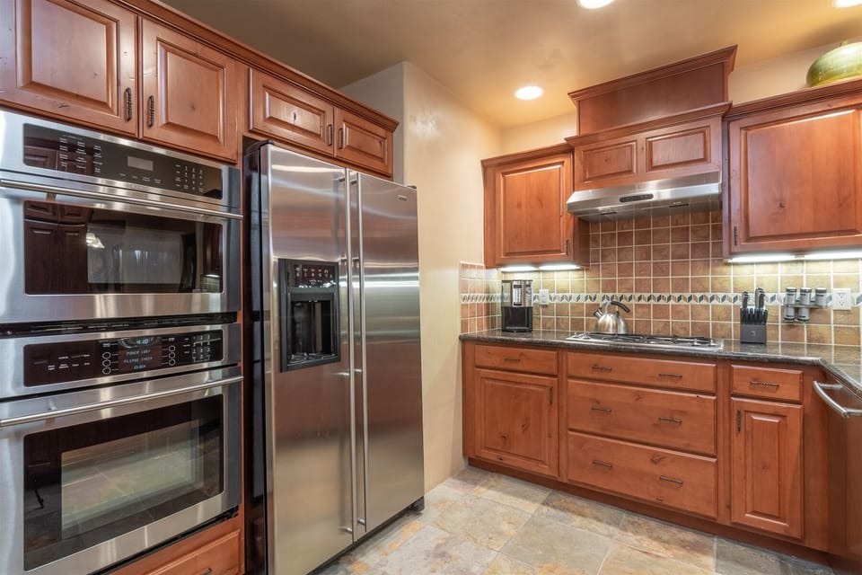 Built-in appliances surrounded by beautiful custom cabinetry!
