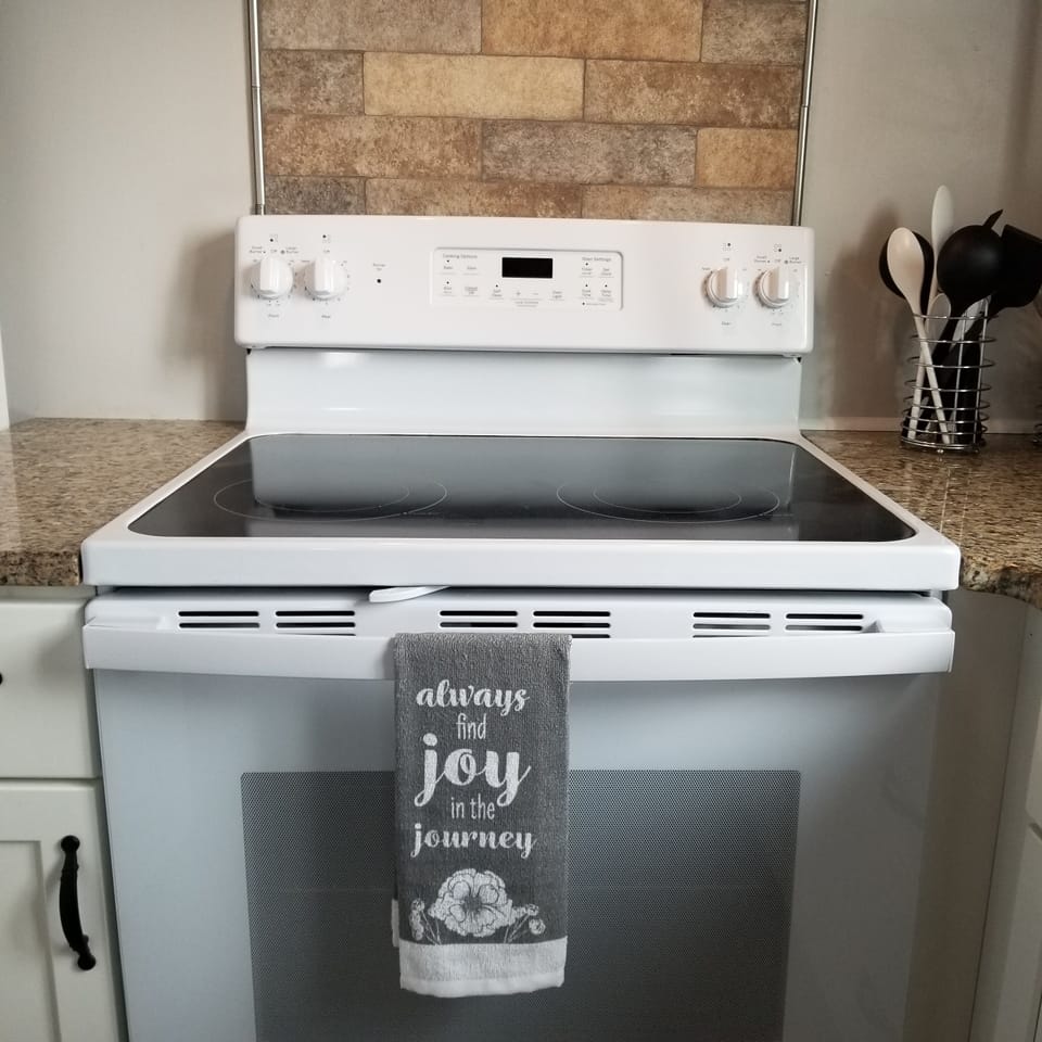 New stove with hood vent and light. 