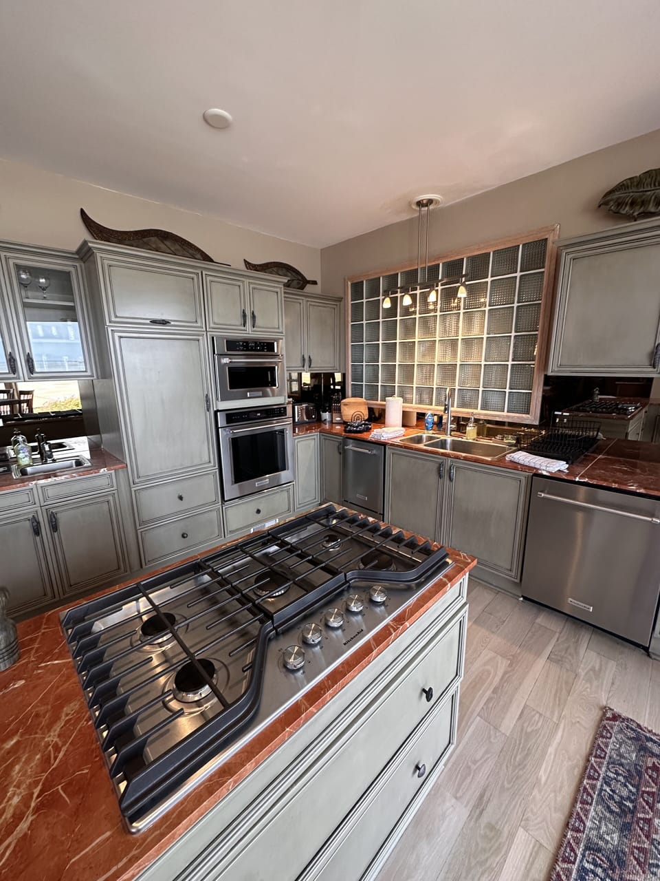 Kitchen with new Kitchen Aid Higher end appliances & Ice Maker. Gas Cooktop