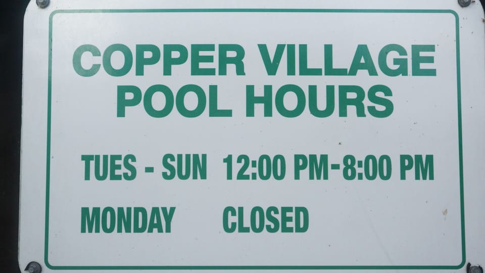 Community pool opening hours at Copper Village.