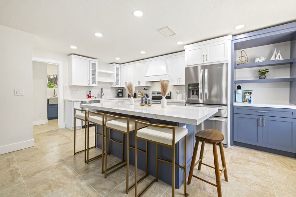 Eat-in kitchen with all major and minor appliances, breakfast island, and lots of counter space.