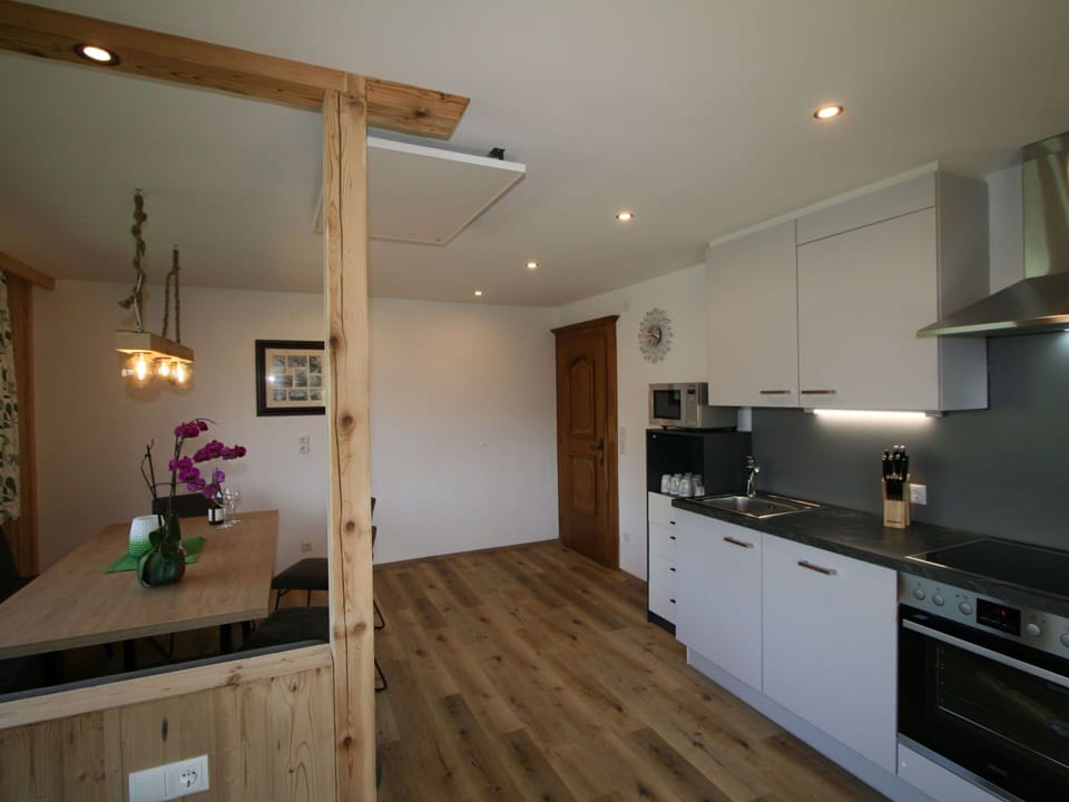Cabinetry, Countertop, Wood, Lighting, Drawer, Kitchen, Architecture, Building, Floor
