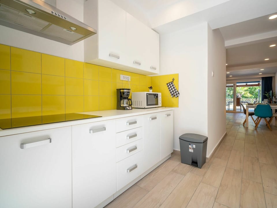 Cabinetry, Furniture, Building, Drawer, Interior Design, Flooring, Countertop, Wood, Floor