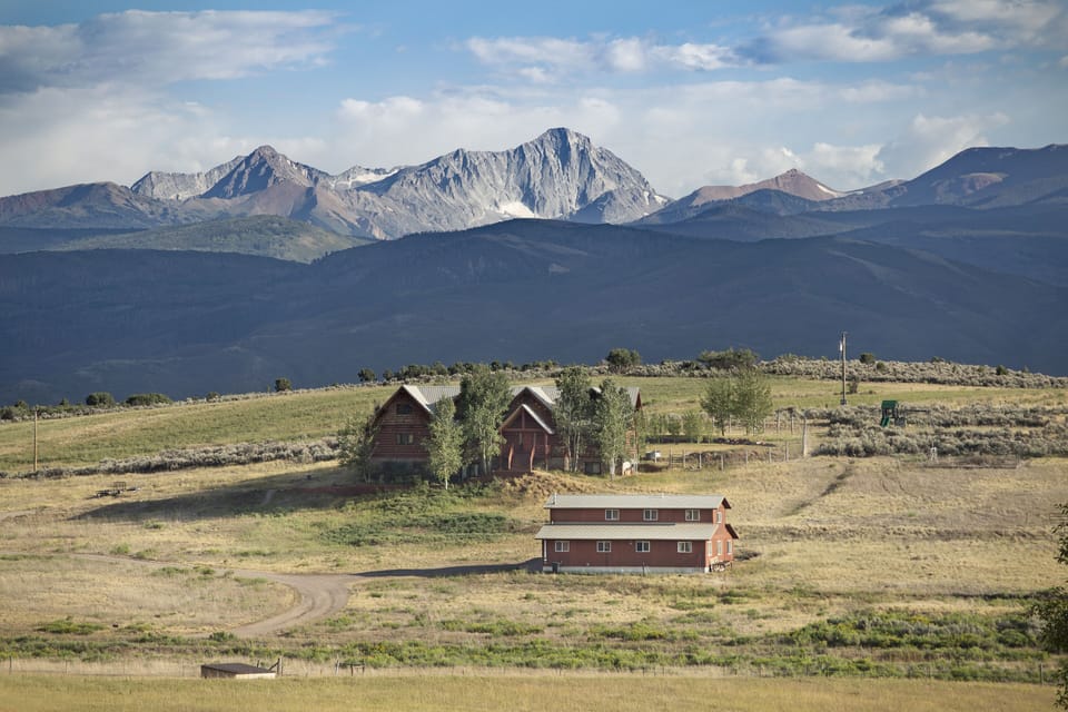 Your home is the red building in the foreground. Capitol Peak/Mt. Sopris views.