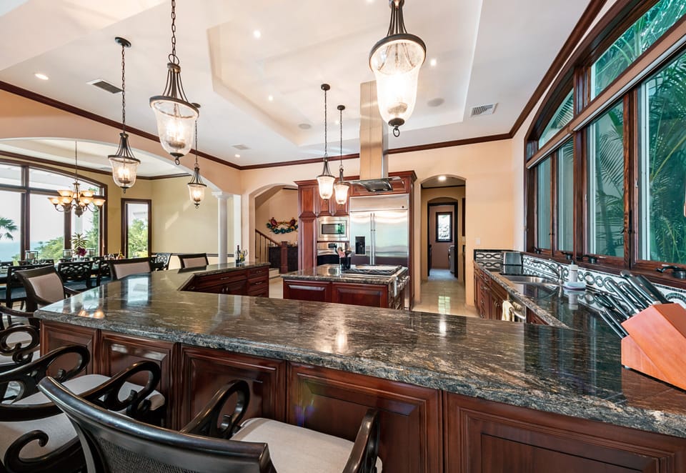 The spacious kitchen is fully equipped for your every need. 