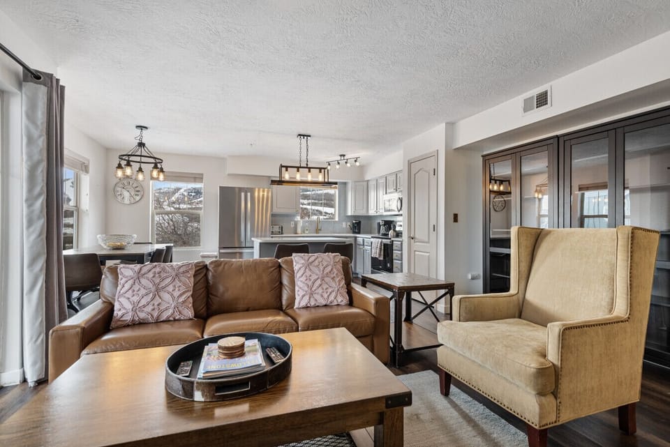 Spacious Living Room with fireplace, TV, and Sleeper Sofa