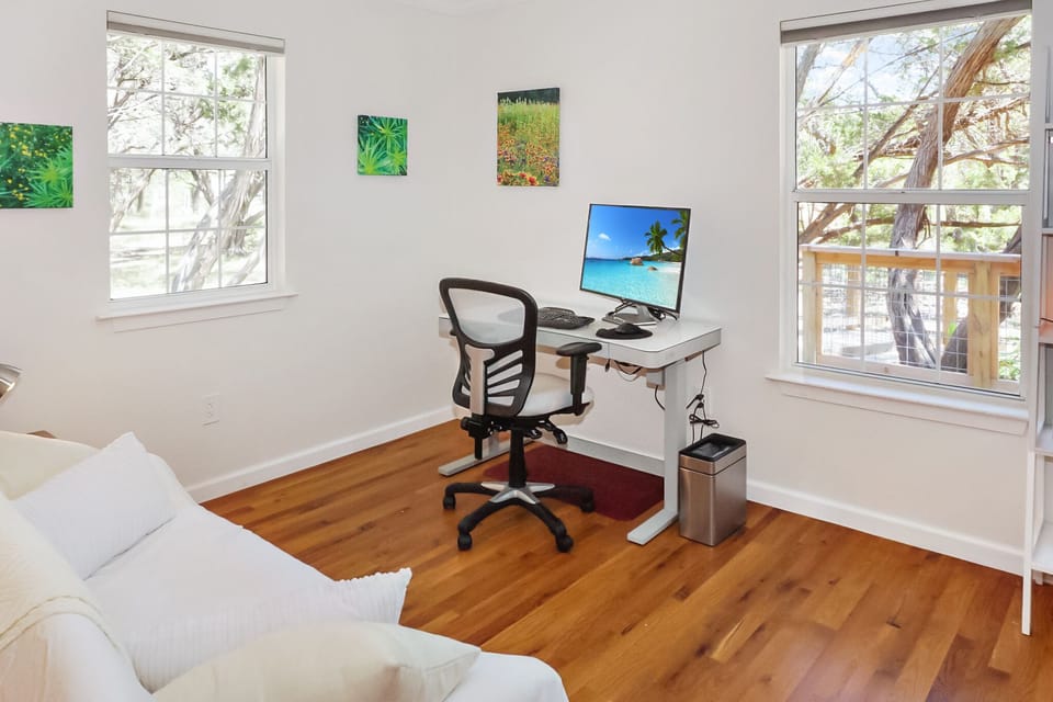 Bedroom 3 downstairs is utilized as an office