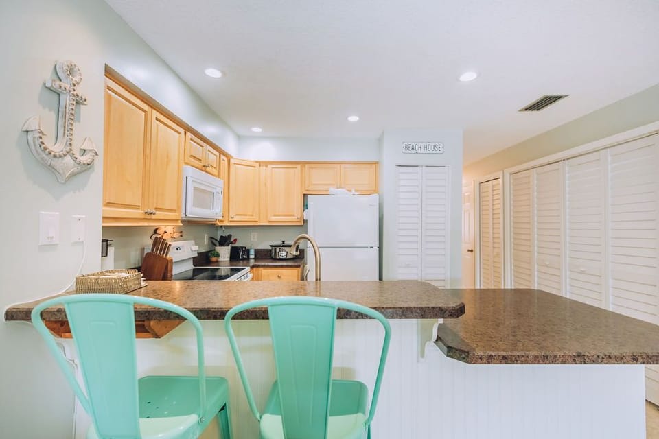 The breakfast bar is perfect for morning coffee.