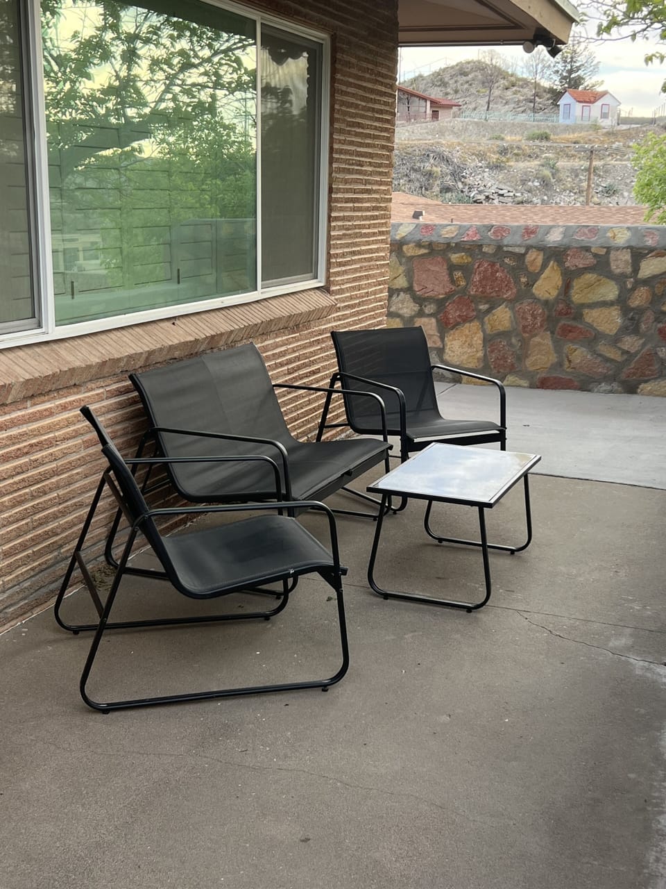 Outdoor furniture on front patio