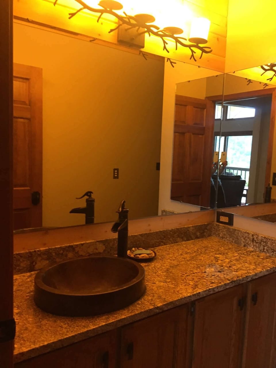 Master Bath #1 features a copper sink and plenty of counter space 