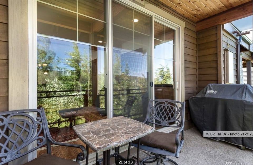 Patio is small with a gorgeous view . Fits two chairs. 😊