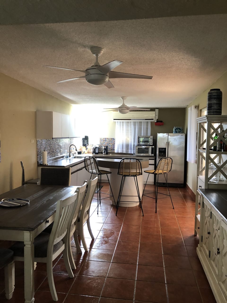 View of dining room and kitchen