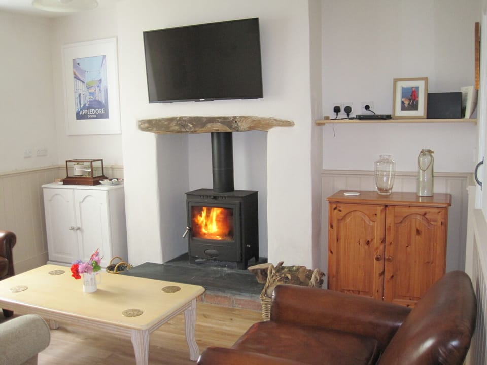 Snug with wood burner and Sky tv.