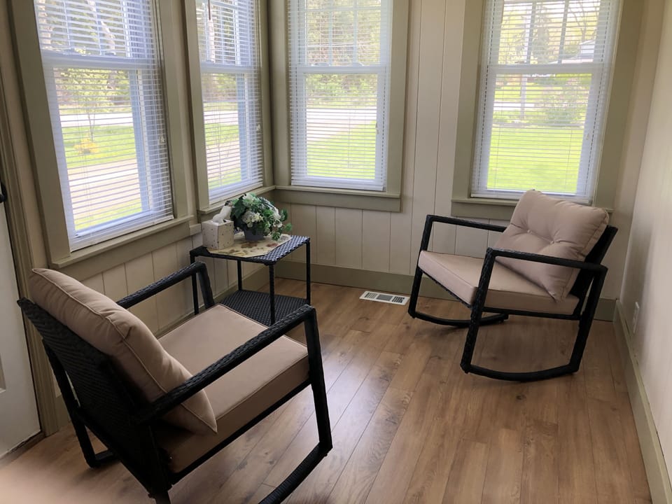 Enjoy morning coffee or a nice summer breeze in the sunroom