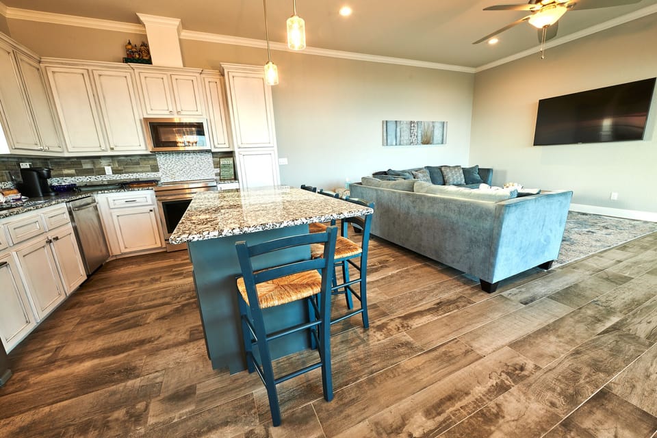 Kitchen and living room.
Photo by Carmel Studios Photography