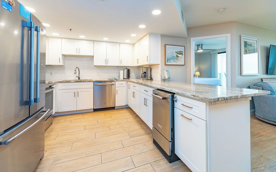 Create delicious meals together in this inviting kitchen, where modern finishes enhance your cooking experience