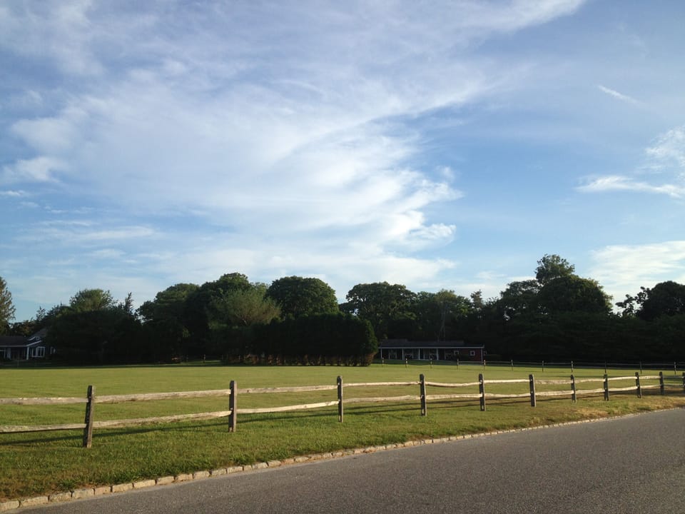 Surrounded by horse farms. 
