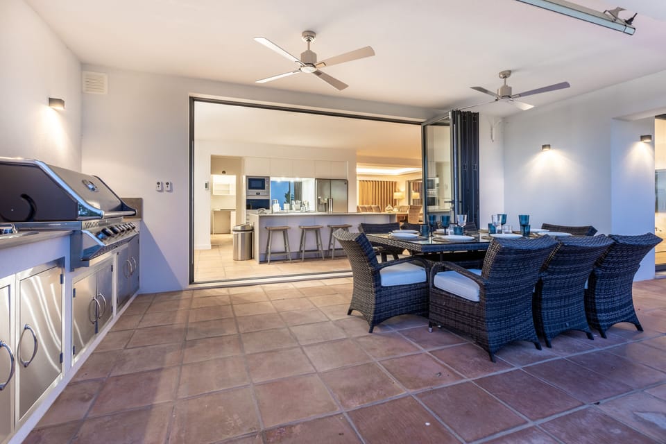 Indoor outdoor flow from kitchen and open plan living area.