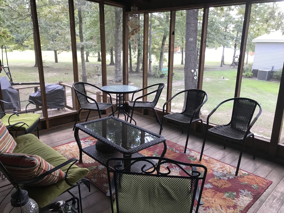 Screened porch with partial lake view