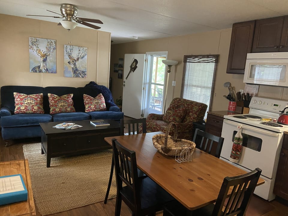 Living room with smart TV to use all your favorite Apps or
 sign in to our HULU.