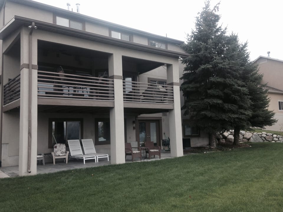 back patio, lower level is the rental, patio only for guest access, viewing SLC 