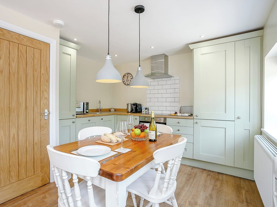 Kitchen and dining area | Wits End Cottage, Roughton, near Woodhall Spa
