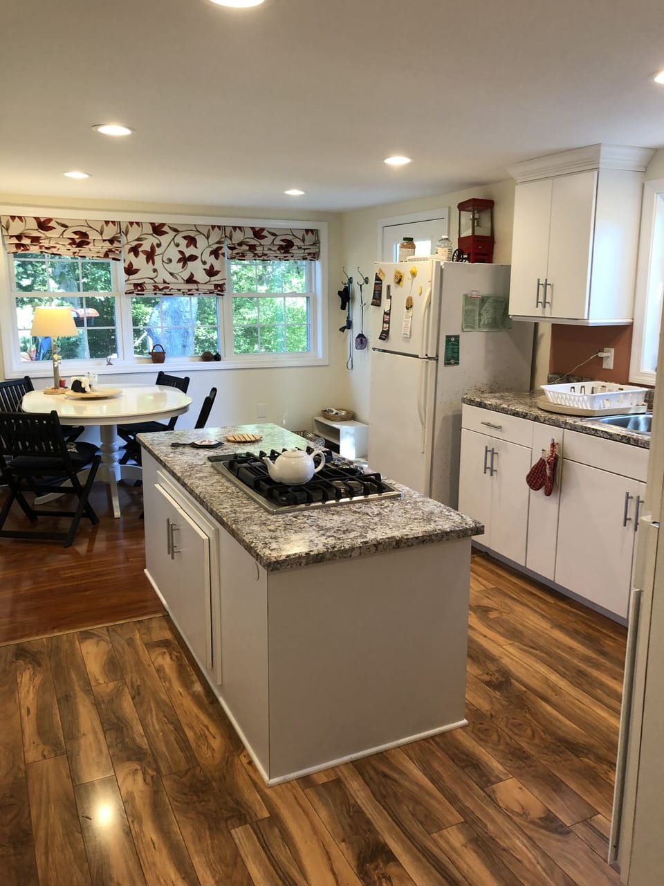 The kitchen island is a few inches lower than normal, for Gramma.