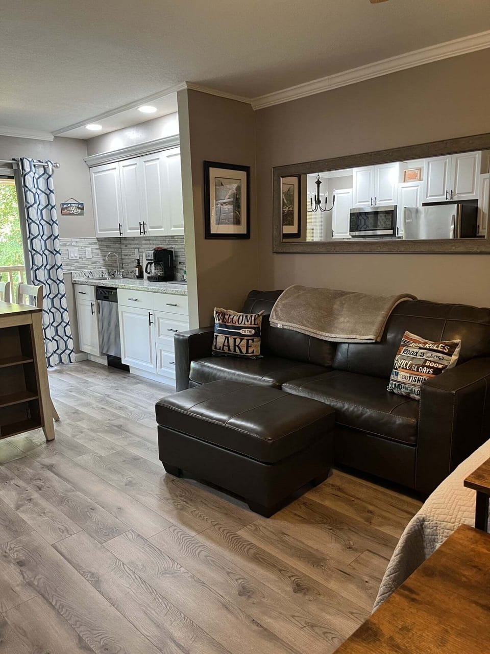 Cozy couch with foot stool perfect for a relaxing movie night