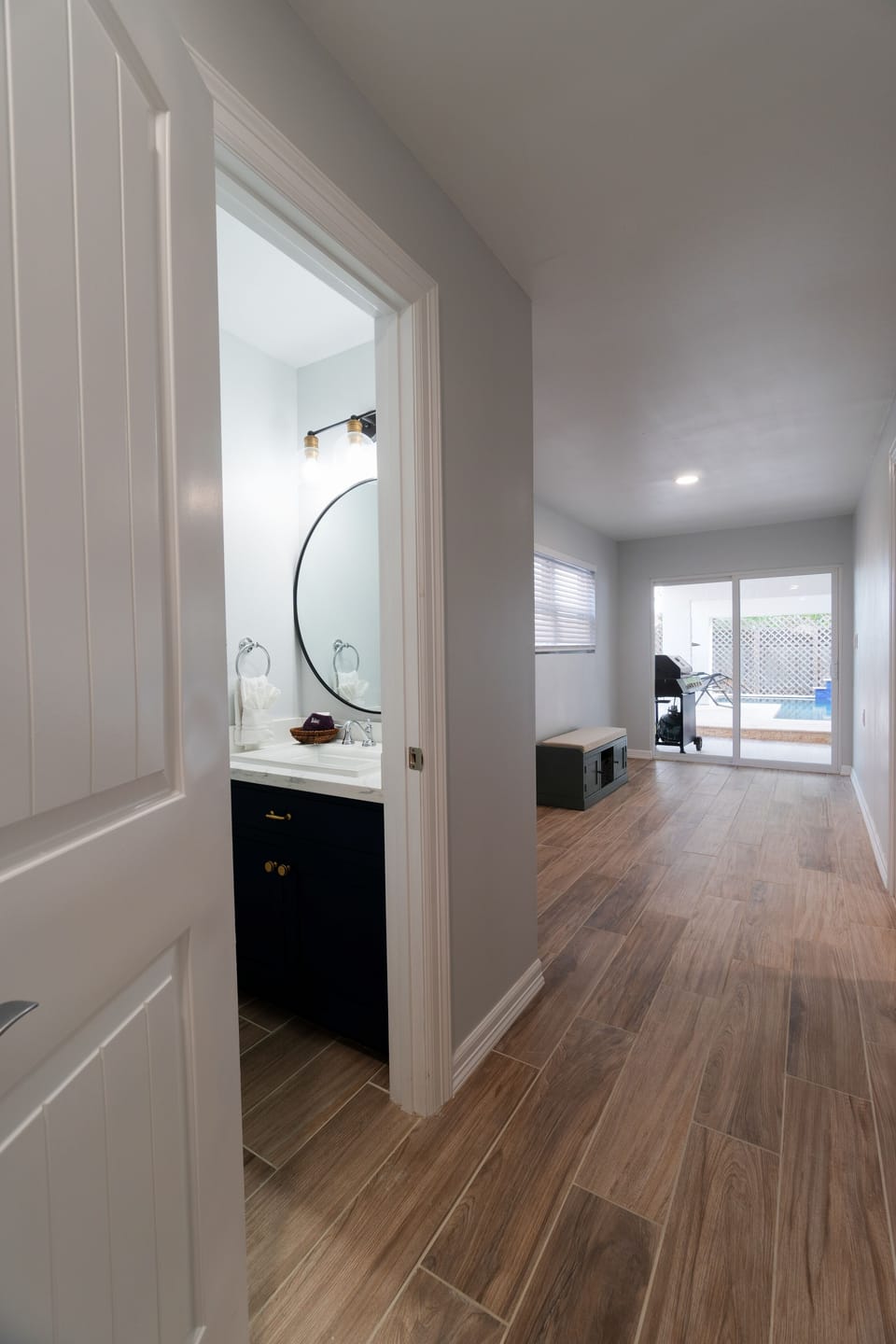 Half bathroom located on the ground floor and next to the patio with private pool!