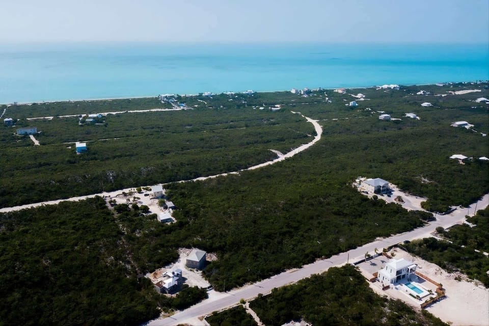 Enjoy an easy walk or drive to beautiful Long Bay Beach.
