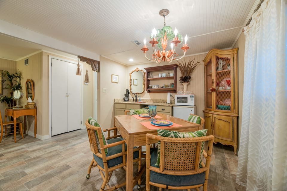Carriage house-downstairs suite includes mini-fridge, microwave, and dining area