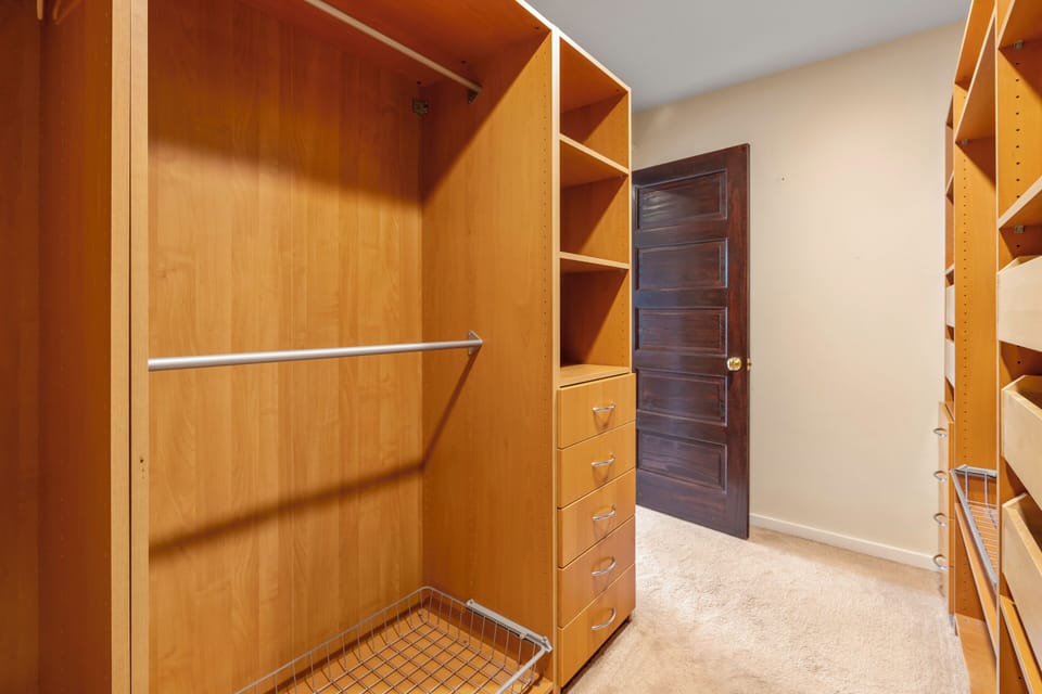 Spacious walk-in closet with ample storage space.