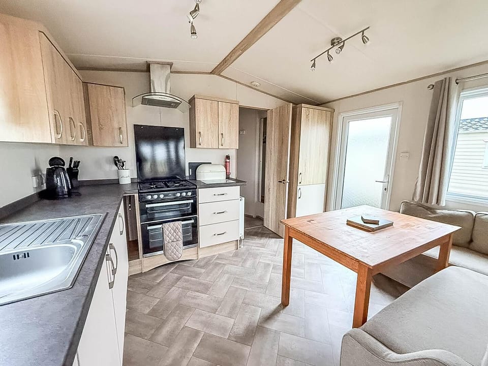 The holiday home living room is an inviting space to relax after a day of adventure.