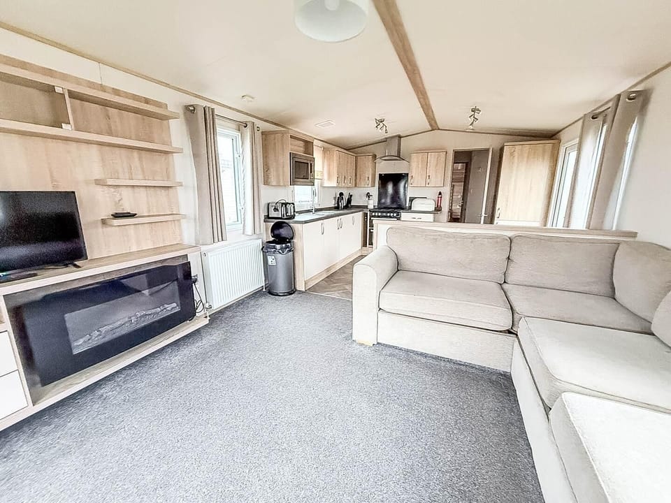 The living area in the caravan is designed to make family time comfortable and enjoyable.