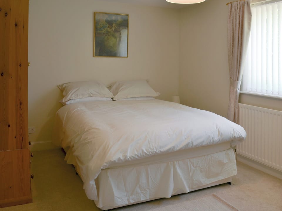 Comfortable double bedroom | Fairways Cottage, Belford, near Bambugh