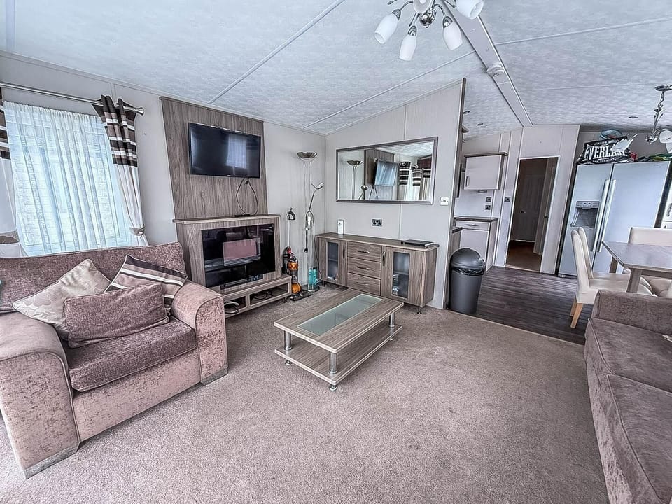 After a thrilling day at the Hippodrome Great Yarmouth or the Pleasure Beach Great Yarmouth, retreat to the cosy living room in a caravan at Park Holidays Broadland Sands for a relaxing evening.